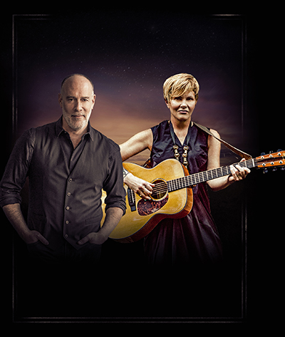 Singer-songwriters Marc Cohn and Shawn Colvin, who is playing an acoustic guitar
