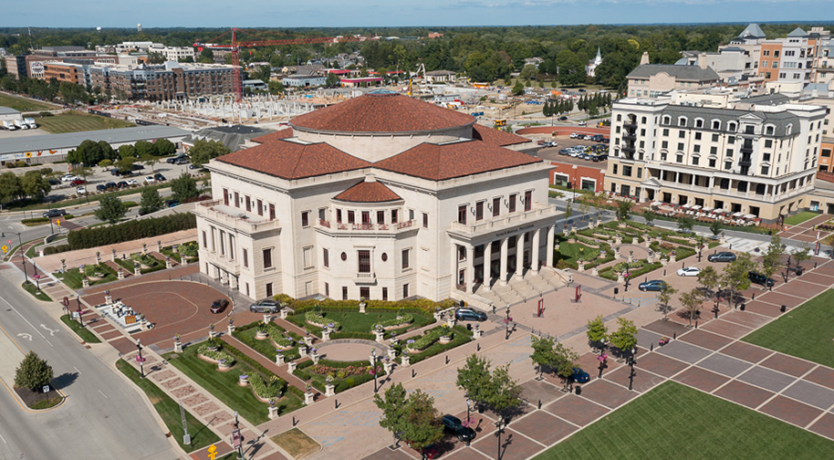 Pmp Drone Street 914X504 The gardens and south steps of the Payne & Mencias Palladium at Allied Solutions Center viewed from a drone.