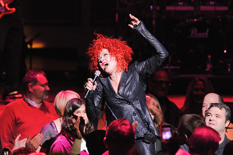 Cyndi Lauper sings amid the audience at the Palladium in 2011.