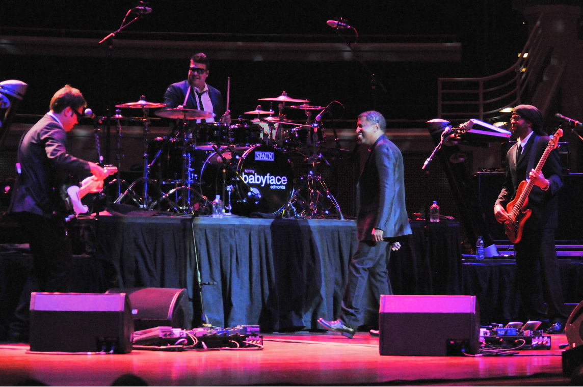Babyface and his band perform on the Palladium stage in 2012.