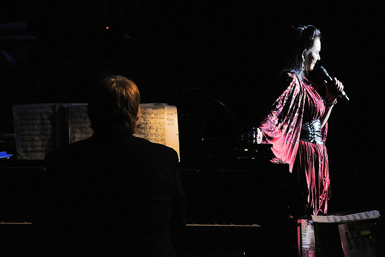Country star Crystal Gayle and a pianist perform on the Palladium stage.