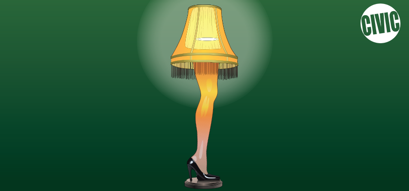 A table lamp in the form of a woman's leg with fishnet stockings and black high heel show stands on a pedestal and glows against a green background.