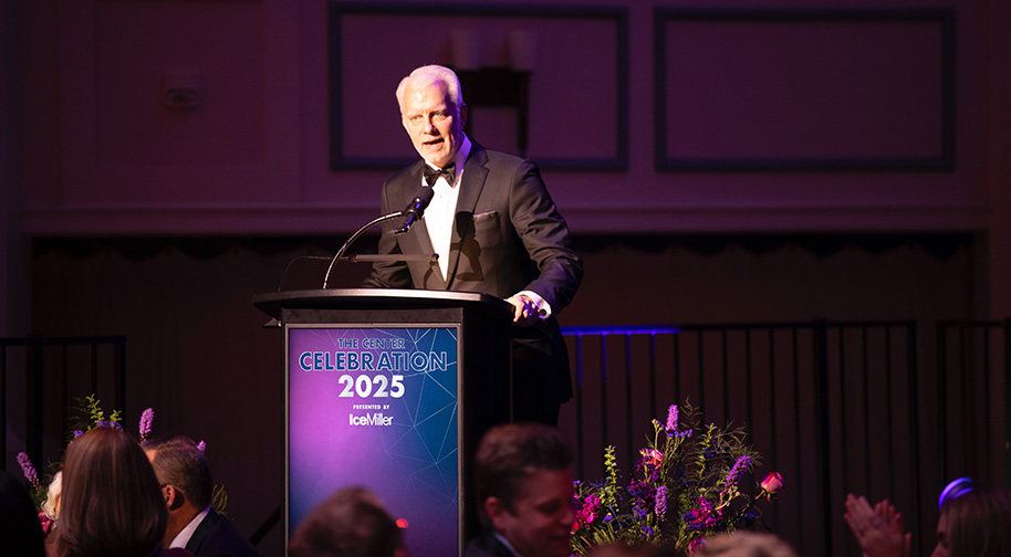 Allied Solutions Center President and CEO Jeff McDermott welcomes guests to the Center Celebration 2025 on stage.