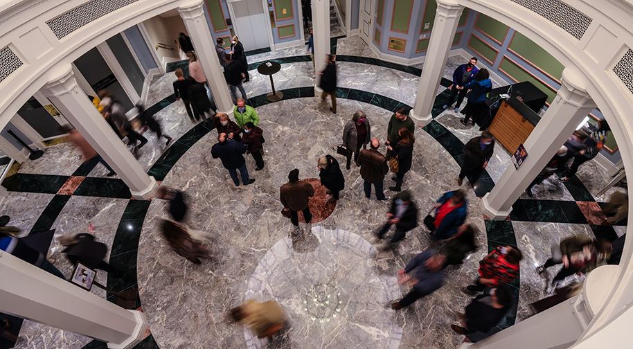 Patrons mingle in the Palladum's east lobby prior to a performance.